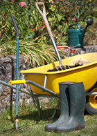 gardening service - wheelbarrow and wellies